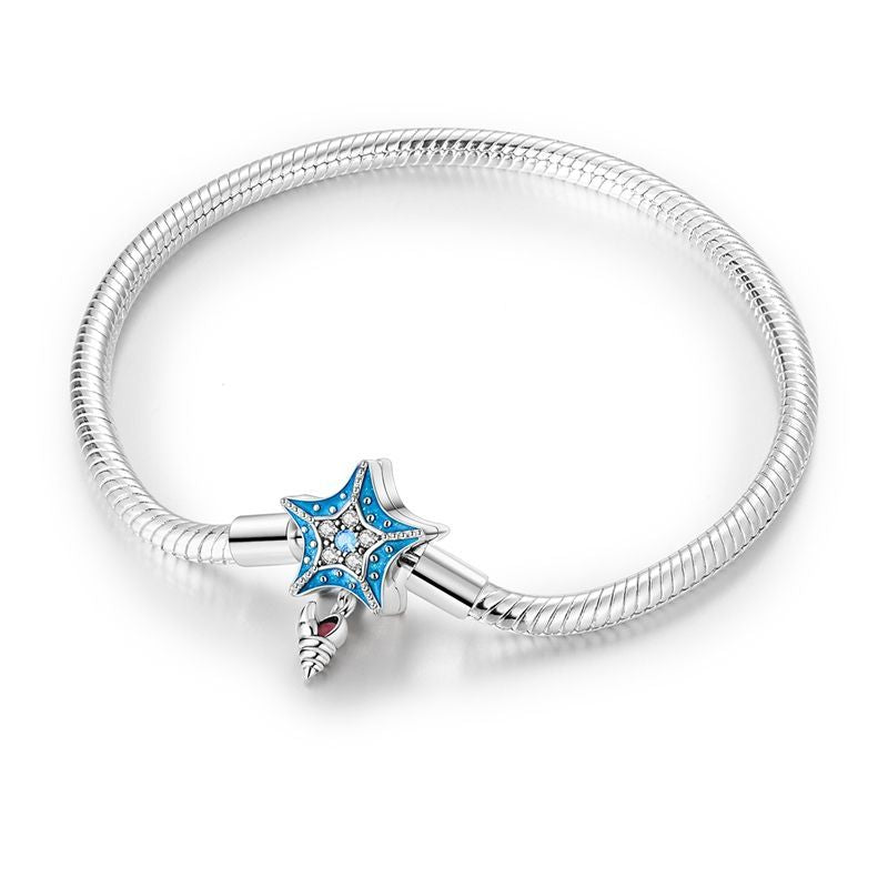PULSERA ESTRELLA DE MAR Y CARACOL